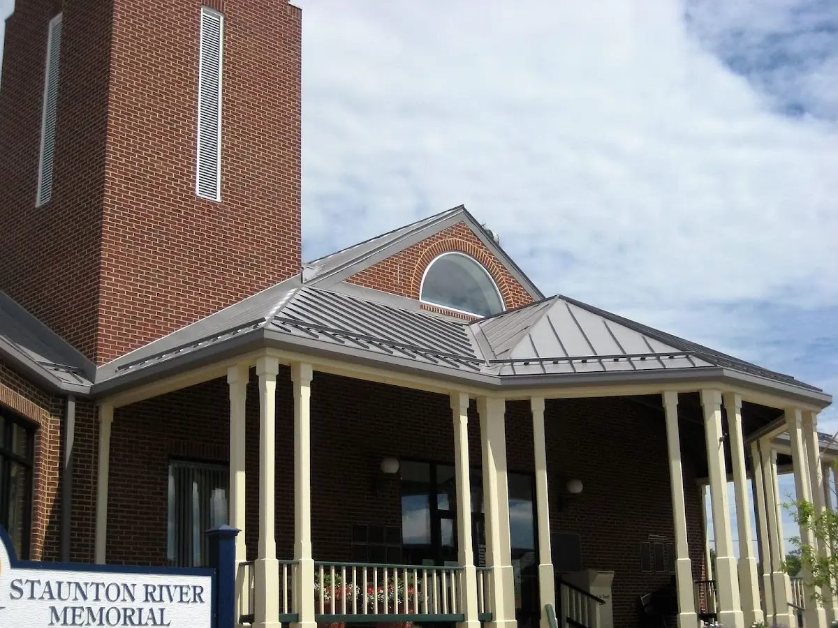 Skilled roofing craftsmen working on a residential roof in Agnewville